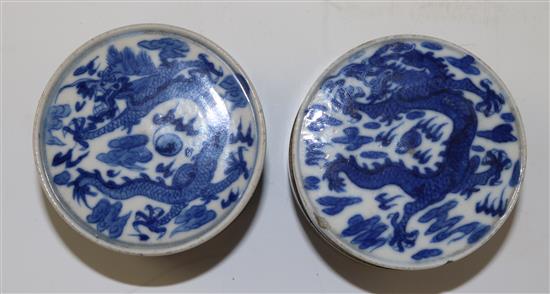 Two Chinese blue and white dragon seal paste boxes and covers, 19th century, diameter 6cm, some damage